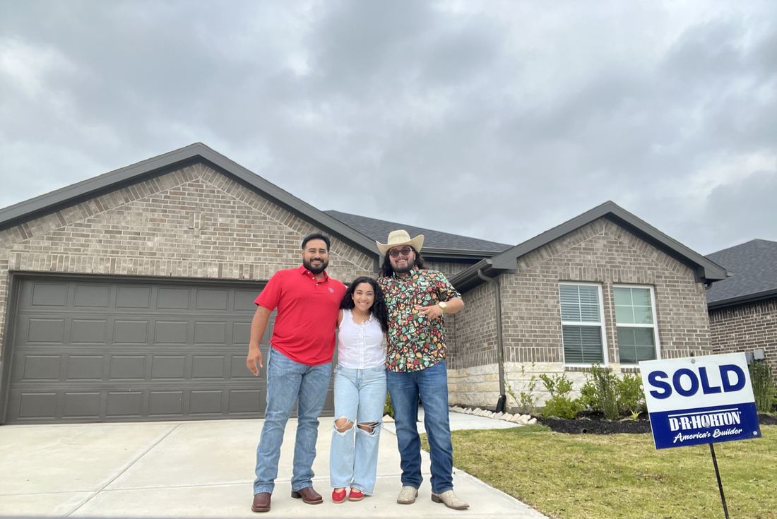 Happy buyers at closing with Adrian Arizmendi