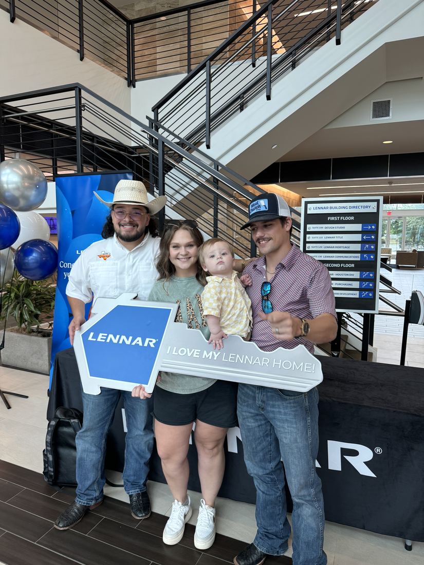 Adrian Arizmendi with happy homebuyers